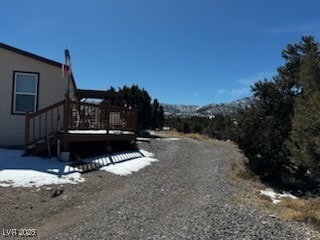 View of road with gravel driveway