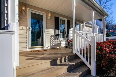 Sunny country covered porch with storm door