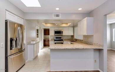 16266 N 29th Dr-large-006-9-Kitchen-1500