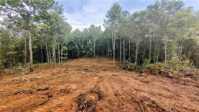 View of a cleared house build site just behind the highest house build site.