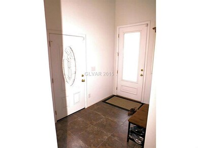 Entry Hall. Entry door and side door to play yard/