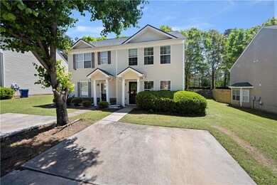 View of front of property with a front lawn
