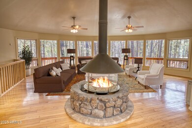 Staged Great Room with Circular Fireplac