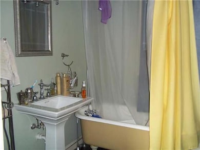 Photo. Upstairs bedroom wuite bathroom with a larg