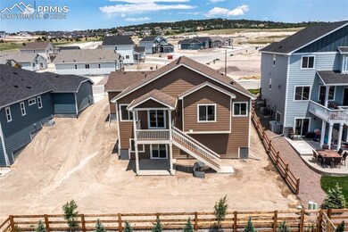 Back of property featuring central AC
