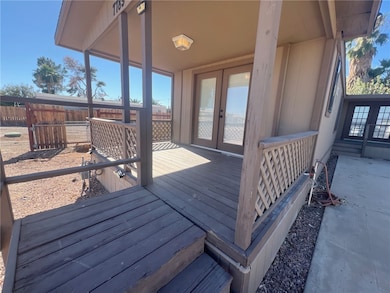 Wooden terrace with French doors to enjoy morning coffee