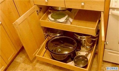 Convenient pull out drawers and pot shelves where 
