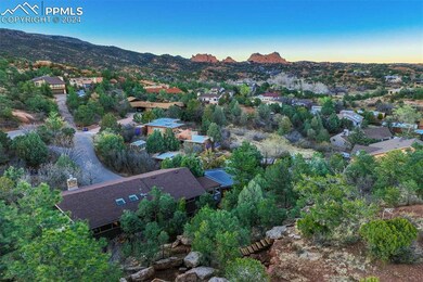 Aerial view at dusk with a mountain view & Garden 