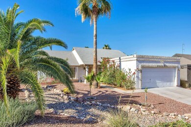 1237 E Kristal Way-large-002-12-Front Ex