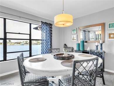 Dining space with plenty of natural light, a water