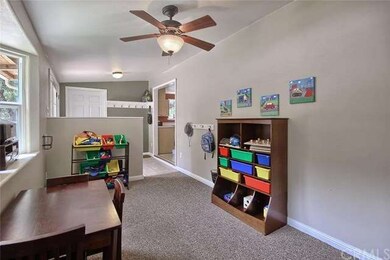 Sunroom currently a playroom ... office, utility, 
