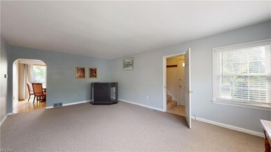 Living room, looking toward dining room, with sepa