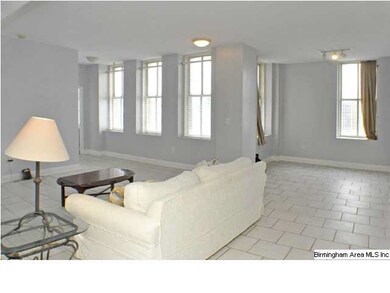 Natural light fills the spacious living room throu