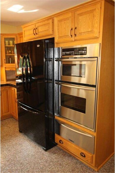 Kitchen w/built-ins and newer refrigerator