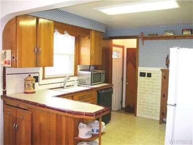 Kitchen. Bright, sunny kitchen with tiled countert