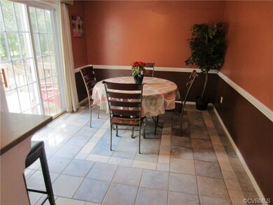 The Eat-in Area of the Kitchen features Chair Rail
