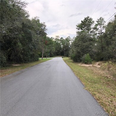 Looking west down the street, the home site is on