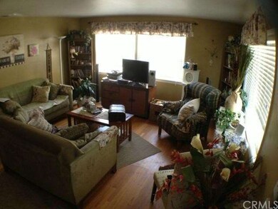 Nice Sized Living Room with the Original Hardwood 