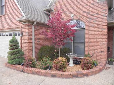 Landscaped area in front adds to curb appeal of th