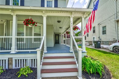 Entrance to property featuring a porch