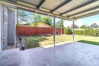 Fenced backyard featuring a patio area