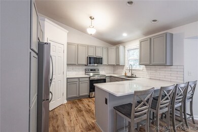 Kitchen with bar seating.