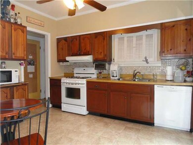 Kitchen. Looking into kitchen from dining room.  F