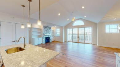LIVING ROOM VIEW FROM OPEN CONCEPT KITCHEN AREA