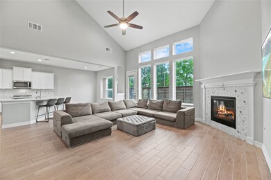 The open-concept living area seamlessly flows into