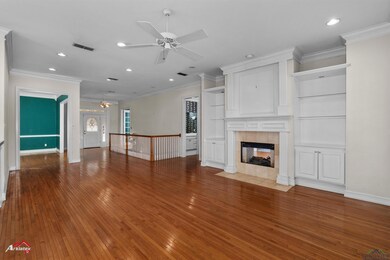 Unfurnished living room featuring a tile fireplace