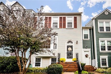 Yes, that is a Crepe Myrtle tree in the front, & m