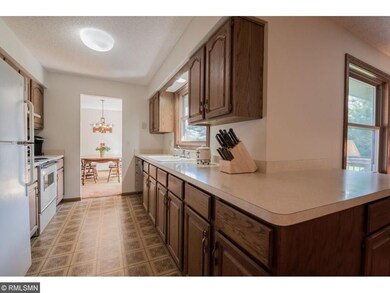 Galley kitchen provides easy access to the formal 