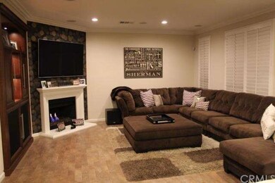 Family room with custom built-in entertainment cen