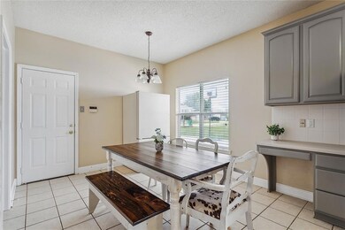 Breakfast nook with access to the laundry room and