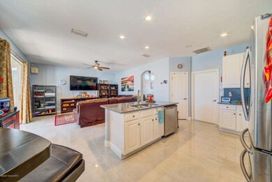 Kitchen opens to Family Room