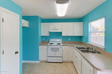 7939 Cherry Blossom Dr N, Jacksonville, FL 32216 - photo 5