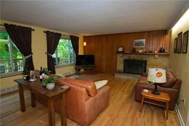 Stunning hardwood flooring highlights this 18x15 L