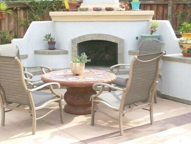 Gas Burning Fireplaceout in the Patio Area with pe