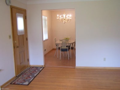 View 2 of Living Room with hardwood floors looking