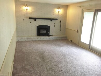 Family room with fireplace.