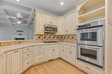 kitchen featuring custom cabinetry, solid surface 