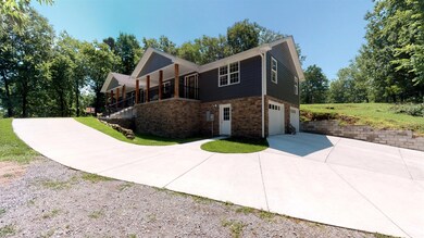 Basement Level: 2 Car Garage, Rec Room, Kitchenette, Full Bath, Hobby Room, Storage Room, Storm Shelter... Could be easily converted into Guest Quarters