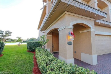 Property entrance featuring stucco siding, an atta
