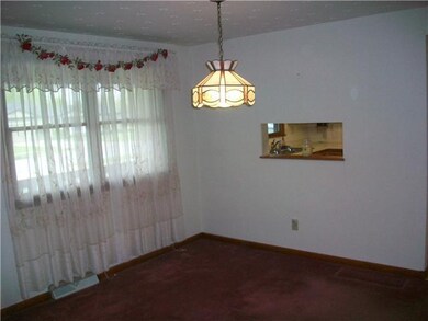Dining Room Large, open dining room with a pass th