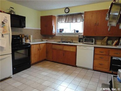 Kitchen. Nice ceramic tile in spacious kitchen.