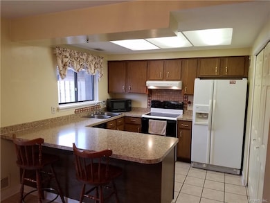 THE NEW MODERN COUNTERTOPS WERE JUST INSTALLED IN 