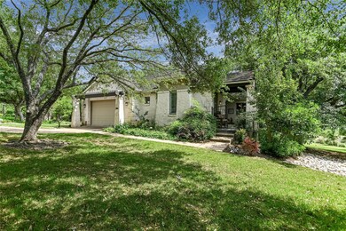 View of property hidden behind natural elements w