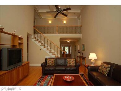 Living Room. Living has wonderful vaulted coffered 2 story ceiling.