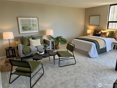 Unit 607 open living area and dining. 550 Sq feet with two sliding doors to the balcony.