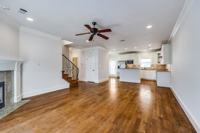 Unfurnished living room with a premium fireplace, 